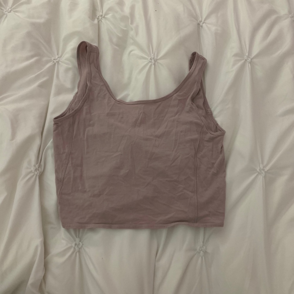 It’s a tie tank from lululemon (mauve color)